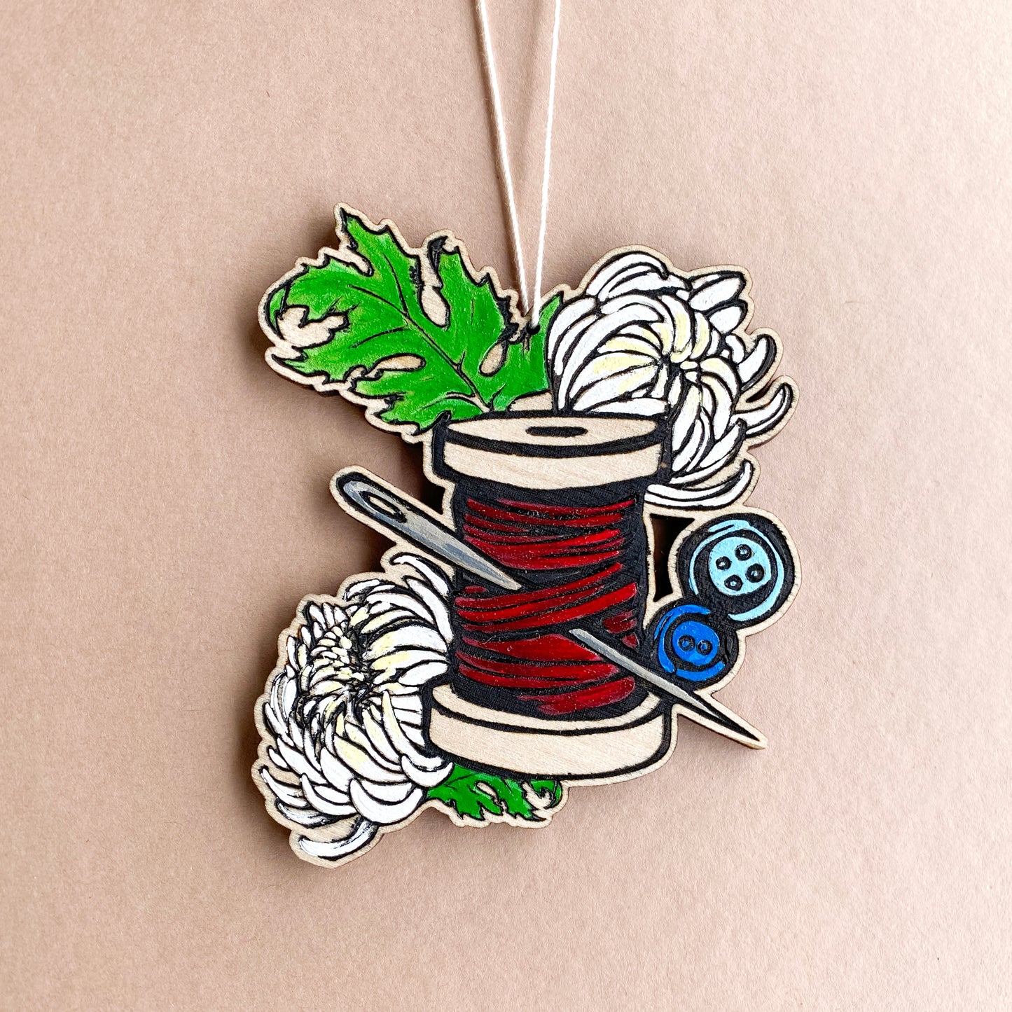 Thread & Bloom – Tattoo-Inspired Spool Ornament